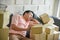 Asian men are falling asleep Because to tired of handling the order-based goods from online customers