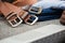 Asian men`s vintage belt stylish, placed on a carpeted gray carpet on the floor.