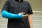 Asian men wear cloth splints on their arms to treat accident injuries