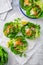 Asian minced meat lettuce wraps with rice, bean sprouts and cabbage