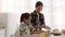 Asian Mother And Daughter Baking Having Fun With Flour Indoor