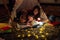 Asian Mother and daughter relax with tent and light in they bed room