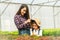 Asian mother and daughter show love in vegetable garden