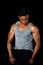 Asian muscle men on the black background