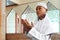 Asian muslim kid praying inside mosque