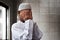 Asian muslim kid praying inside mosque