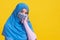 Asian muslim woman in medical mask Coronavirus pandemic disease isolate background. COVID-19 virus epidemic outbreak