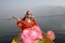 Asian Native Girl rowing a Boat