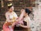 Asian noble beauty with maid dressed in traditional clothes shopping in old retro historical period theme