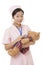 Asian nurse caring for a teddy bear isolated on a white background