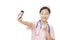 Asian nurse using a cell photo to take a Selfie isolated on white background