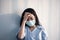 Asian patient woman wearing mask protect virus from sickness in hospital