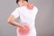 Asian people wear white shirts suffering from back pain. Health concepts