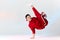 Asian personal break dancer trainer doing handstand on white background