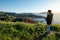 Asian photographer at Golden Gate Bridge