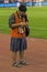 Asian photojournalist with accreditation and a tiny camera during the friendly football game Croatia - Brazil in Split 2005