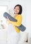 Asian pregnant woman holding yoga mat