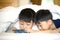 Asian Preschool boys playing on smartphone together