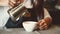 Asian professional female barista pouring milk in latte art coffee at counter bar in cafeteria restaurant as shop owner. Waitress