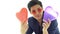 Asian professional pride tomboy lesbian with suit and hearts balloons