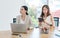 Asian professional successful female businesswomen in formal business wear sitting listening working discussing brainstorming via