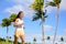 Asian runner girl jogging in nature summer outdoor