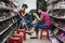 Asian saleswoman in a shoes shop. Shopgirl in a shoes store in Hanoi, Vietnam