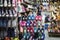 Asian saleswoman in a shoes shop. Shopgirl in a shoes store in Hanoi, Vietnam