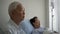 Asian senior couple husband sad worry while support dying disease wife in hospital uncondition love