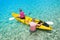 Asian senior couple on kayak in adventure travel in south east asia