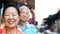 Asian senior couple travel to thailand cruising on the boat in f