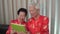 Asian senior elder call to family Chinese New Year celebration