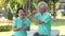 Asian senior elder couple relax happy time in public park quality time together after retirement