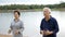 Asian Senior Elderly couple Practice Taichi, Qi Gong exercise ne