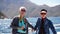 Asian senior elderly couple on tourist ferry boat to seals island trip attracion Fun wildlife watching aticity in South Africa