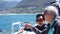 Asian senior elderly couple on tourist ferry boat to seals island trip attracion Fun wildlife watching aticity in South Africa