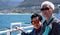 Asian senior elderly couple on tourist ferry boat to seals island trip attracion Fun wildlife watching aticity in South Africa