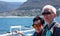 Asian senior elderly couple on tourist ferry boat to seals island trip attracion Fun wildlife watching aticity in South Africa