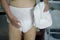 Asian senior or elderly old lady woman patient wearing incontinence diaper in nursing hospital