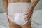 Asian senior or elderly old lady woman patient wearing incontinence diaper in nursing hospital ward, healthy strong medical