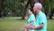 Asian Senior Elderly Practice Taichi, Qi Gong exercise outdoor