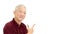 Asian senior pointing smiling on white isolate background