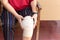 Asian senior woman with bandage compression knee brace support injury.