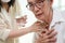 Asian senior woman coughing choking while drinking water or eating food,danger or risk of lung infection,disease of silent