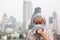 Asian senior woman suffer from cough with face mask protection,elderly woman wearing face mask because of air pollution in the