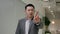 Asian serious man dissatisfied ethnic businessman employer entrepreneur show negative emotion waving finger answer no