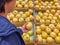 Asian short hair woman picking while buying fresh Korean pear