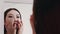 asian skincare facial massage woman touching face