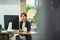 Asian smart woman working with computer in work space cafe