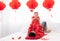 Asian smart young father play together with his son adorable baby  healthy family in red Chinese costume spent time together in